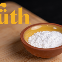 Raw powder of Yüth® nature-identical spermidine powder, a low-dose ingredient for healthy aging and longevity nutrition formulas